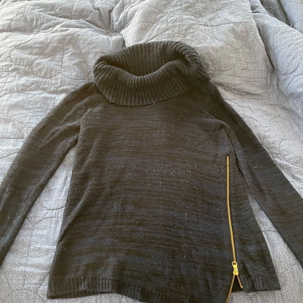 Blue sweater with gold zipper detail